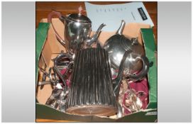 A Boxed Lot of Assorted Plated Items comprising of three teapots, cake divider and numerous items of