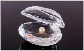 Swarovski Cut Crystal Glass Shell with pearl. 2'' in height. Excellent condition.