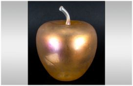 Peach Glass Opalescent Apple. Unmarked and 6 inches in height.