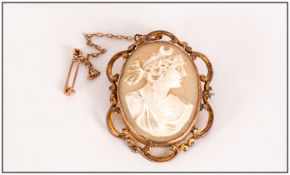 Victorian 9ct Gold Framed Oval Shaped Cameo Brooch with Openwork Border. Marked 9ct. Complete with