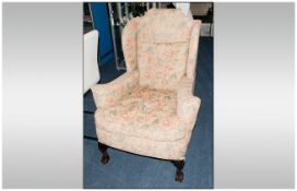 Edwardian George III Style Upholstered Wing Arm Chair with a loose cushion and shaped arm