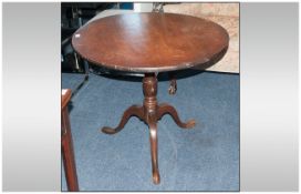 George III Oak Tilt-Top Tripod Table, of circular form, the top made from one piece of mahogany,
