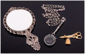 Silver Framed Magnifying Glass Suspended On A Belcher Chain Together With Small Hand Mirror And