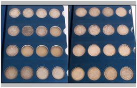 Coin Library Album Containing a Collection of Silver Half-Crowns and Crowns. Dating From Queen