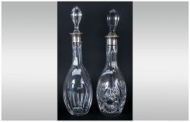 Two Silver Topped Cut Glass Decanters Both With Stoppers. R