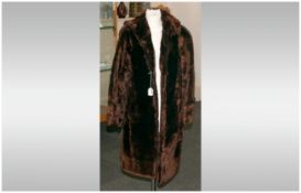 Full Length Dark Brown Beaver Lamb Coat, fully lined.