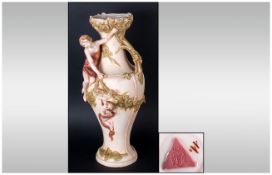 Royal Dux - Bohemia Figural Vase. c.1910. Decorated with Figure of a Young Woman and Winged Cherub
