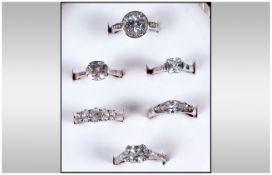 A Fine Collection Of Silver Set CZ Stone Dress Rings, all fully marked of excellent quality.