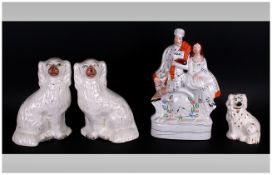 Pair of Staffordshire Spaniels. 12 Inches High, with a Smaller Staffordshire Dog, 6 Inches and a