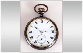 Acier Garanti Gunmetal Open Faced Pocket Watch. c.1920/1930's. White Porcelain Dial, Black Numerals.