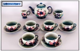 W. Moorcroft ( 15 ) Piece Pottery Tea Set. Comprises Teapot, 6 Cups and Saucers, 1 Milk Jug and 1