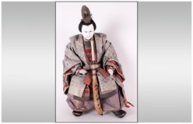 Japanese 19th Century Seated Samurai Warrior Doll Figure. Edo Period. Dressed In Silk Brocade Robe
