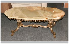 Onyx Shaped Top Low Coffee Table, Supported by a French Style Ormolu Type Base on Cast Shaped