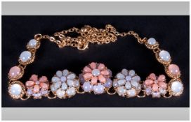 Peach, Lilac and White 'Cat's Eye' Floral Necklace, the centre front comprising double layered