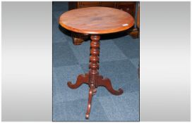 Small Victorian Mahogany Oval Topped Snap Top Parlour Table with a turned central column,