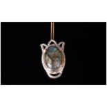 Labradorite Pendant With Chain, the labradorite cabochon, of 12.25cts, displaying a good range of