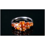 Madeira Citrine Ring, oval cuts of the deep, rich Madeira citrine, totalling 1.75cts, set in a