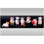 Seven Piggies Porcelain Figures. Standing In Various Poses. Approx 4 Inches High.