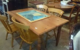 Pine Rectangular Table with 4 Pine Chairs.