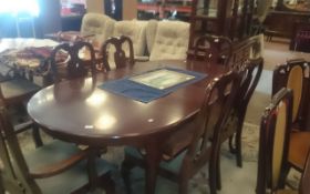 Dark Wooden Table with Matching Chairs.