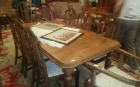 Large Wooden Table and Matching Chairs.