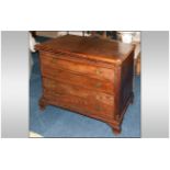 George III Mahogany Dressing Slide Gentleman's Chest of Drawers with a heavy moulded edge top, below