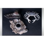 Three Metal Inkwells, one in the rococo style, marked to base, Modele Depose, tree trunk form, alloy