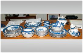 Blue Willow Pattern Dinner Service comprising (42) pieces approximately. Comprises tureens, dinner