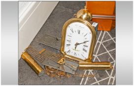 A Reproduction Brass Wall Clock with enamel dial. Maker Dupont A St Denis.