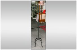 Decorative Four Branch Floor Standing Candelabra in black cast iron finish. 62 inches high