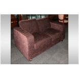 Contemporary Two Seater Brown Velour Sofa.