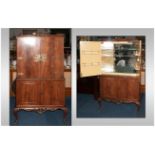 Mahogany Queen Anne Style Cocktail Cabinet with a cupboard top with fine engraved brass hinges and