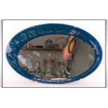 A 1960's Retro and Unusual Design Oval Mirror. The Border Decorated with Abstract Images on Black