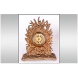 A Cast Brass & Gilded Victorian Mantle Clock depicting Grouse amongst corn sheaf's. Makers name to