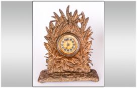A Cast Brass & Gilded Victorian Mantle Clock depicting Grouse amongst corn sheaf's. Makers name to