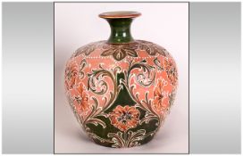 William Moorcroft Signed Florian Ware Globular Shaped Vase, Salmon Pink Colourway Circa 1908. 5.