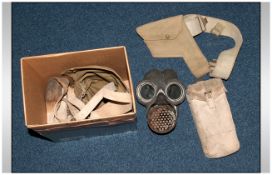 WW2 Gas Mask In Canvas Bag Together With A Gun Holster, Webbing, Belt etc