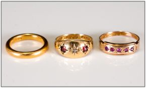 Two Ruby Set Rings In 18ct & 15ct Gold Together With A6 22ct Gold Wedding Band.