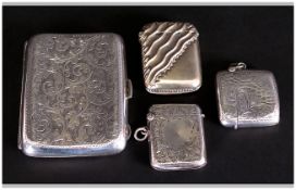 Two Silver Vesta Cases Hallmarked For Birmingham i & C Together With A Plated Vesta And A Silver