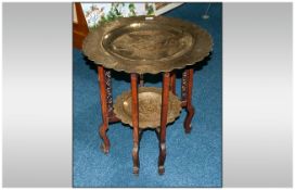 Oriental Style Coffee Table, with Carved Wooden Folding Base and Brass Engraved Top. 25 Inches High,