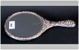 Edwardian Silver Embossed Ladies Hand Mirror, Hallmark Birmingham 1908, 11'' in length.