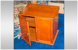 Mahogany Double Door Table Cabinet with a hinged lift up top with single interior shelf. 20 inches