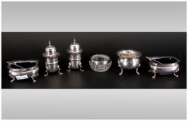 Small Collection Of Silver Table Ware Comprising Two Silver Pepperettes, Cut Glass Salt And Two