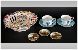 Italian Pottery Encrusted Flower Basket, three Coalport miniature hunting wall plaques and a pair of