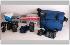 Pentax SFXN Super Focus Film Camera. Together with assorted zoom lenses, flash gun and