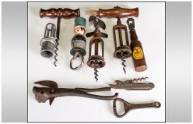 A Collection of Vintage Cork Screws and Bottle Openers.