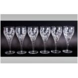 A Top Quality Set of Six Cut Glass Wine Glasses, with Etched and Cameo Floral Decoration to Each