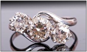 18ct White Gold Set Three Stone Diamond Ring the round brilliant cut diamonds of good colour. Marked