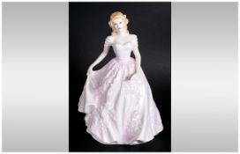 Royal Doulton Collectors Society Figure. Figure dressed in pale pink evening dress, lady carrying