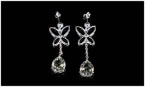Green Amethyst and White Topaz Drop Earrings, two pear cut green amethysts, each over 3cts,
